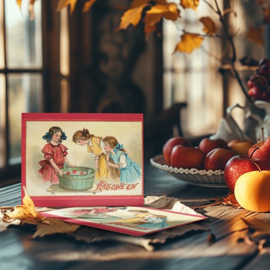 ヴィンテージのハロウィーンの女の子はリンゴのためにボビング カード