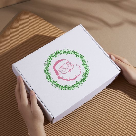 ヴィンテージのピンクのサンタフレームを緑のリースが囲むクリスマス シール