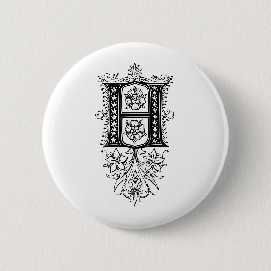 ヴィンテージのモノグラムHの花の大文字 缶バッジ (正面)