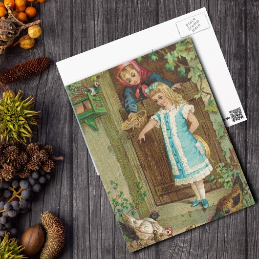 ヴィンテージの女食べ物を与えの子 ポストカード