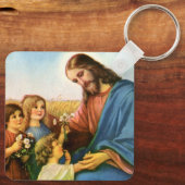 ヴィンテージの子どもがイエス・キリストに花を持って来る キーホルダー (裏面)