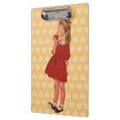 ヴィンテージの小さな女の子の赤い服Apple クリップボード (左)