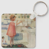 ヴィンテージの少女、洗濯物を干す子供 キーホルダー (裏面)