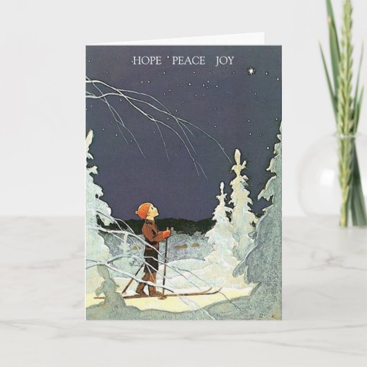 ヴィンテージの少年がスキーでクリスマスの星を鑑賞する シーズンカード (正面)