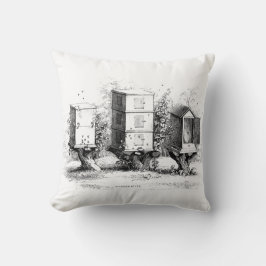 ヴィンテージの蜂は白いクッションの枕黒を巣箱に集めます クッション