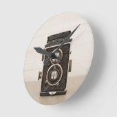ヴィンテージのRolleiflex対レンズのカメラ ラウンド壁時計 (傾斜)