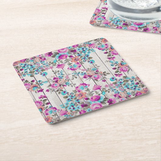 ヴィンテージはティール(緑がかった色)の花の白く素朴な木製のパネルを飾ります スクエアペーパーコースター (アングル)