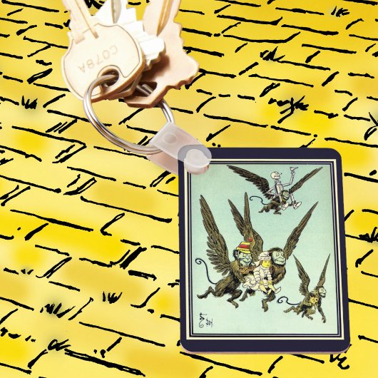 ヴィンテージオズの魔法使い飛んでいるドロシーとサル キーホルダー