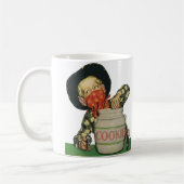 ヴィンテージカウボーイトイガンハンドインザクッキージャー コーヒーマグカップ (左)