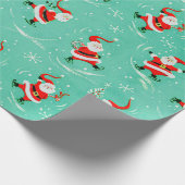 ヴィンテージクリスマスアイススケートで滑るサンタラッピング紙 ラッピングペーパー (角)