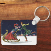ヴィンテージクリスマスカップルinラブアイススケートで滑る キーホルダー (正面)
