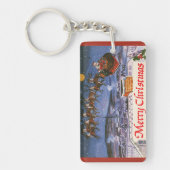 ヴィンテージクリスマスサンタクロース飛んでいる彼のそり キーホルダー (正面)
