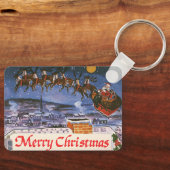 ヴィンテージクリスマスサンタクロース飛んでいる彼のそり キーホルダー (正面)