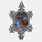 ヴィンテージクリスマスサンタクロース飛んでいる彼のそり スノーフレークピューターオーナメント (左)