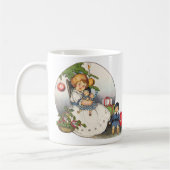 ヴィンテージクリスマスハッピーガール遊ズと人形 コーヒーマグカップ (左)