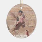 ヴィンテージクリスマスボーイ飛んでいる飛行船ファンタジーセラム セラミックオーナメント (左)