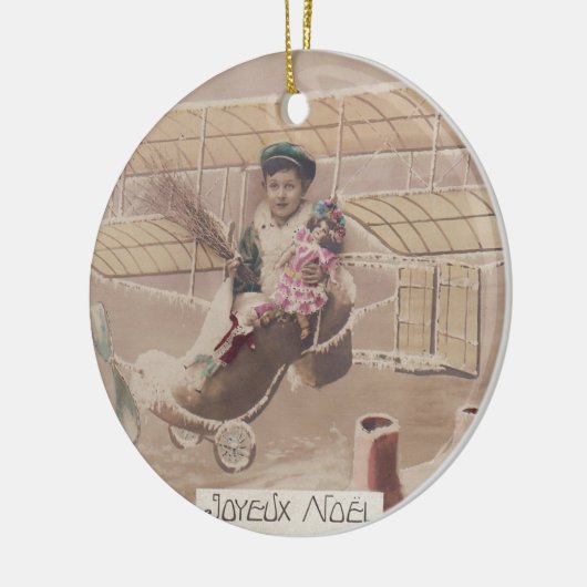 ヴィンテージクリスマスボーイ飛んでいる飛行船ファンタジーセラム セラミックオーナメント (左)