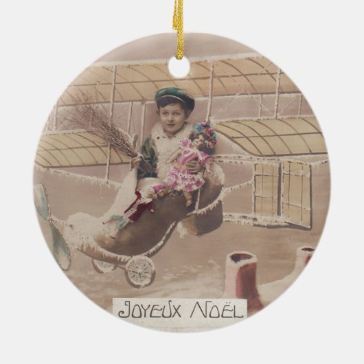 ヴィンテージクリスマスボーイ飛んでいる飛行船ファンタジーセラム セラミックオーナメント (裏面)