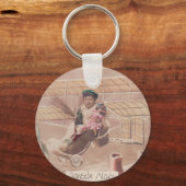 ヴィンテージクリスマスボーイ飛んでいる飛行船ファンタジー キーホルダー (正面)