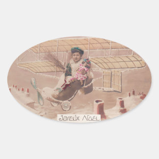 ヴィンテージクリスマスボーイ飛んでいる飛行船ファンタジー 楕円形シール