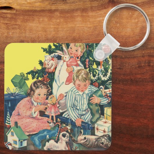 ヴィンテージクリスマスモーニング、子供たちが贈り物を開く キーホルダー (裏面)