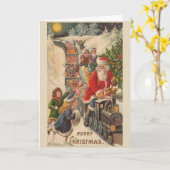 ヴィンテージクリスマス – サンタのトイズ&トリーツの列 カード (黄色い花)