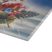 ヴィンテージクリスマス、サンタのトナカイが引く飛行するそり カッティングボード (角)