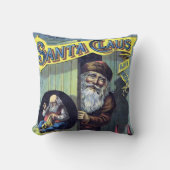 ヴィンテージクリスマス、サンタクロースと彼の作品集 クッション (正面)
