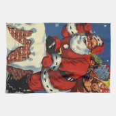 ヴィンテージクリスマス、サンタクロースの煙突から降りてくる様子のおもちゃ付き キッチンタオル (横)