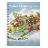 ヴィンテージクリスマス、サンタクロースの飛行機 ノートブック (正面)