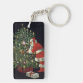 ヴィンテージクリスマス、プレゼントを手にしたいサンタクロース キーホルダー (裏面)