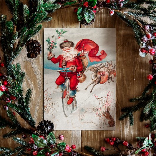 ヴィンテージクリスマス。レトロサンタクロースと鹿 シーズンカード