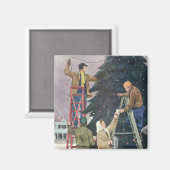 ヴィンテージクリスマス、家族がツリーにイルミネーションを飾る マグネット (正面/裏面)