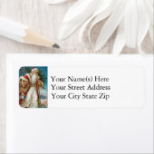 ヴィンテージサンタがおもちゃや木のクリスマスを配達 ラベル (インサイチュ)