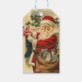 ヴィンテージサンタがストッキングを満たすクリスマス ギフトタグ (正面)