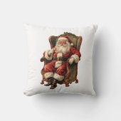 ヴィンテージサンタが心地よい椅子に座るクリスマス クッション (正面)