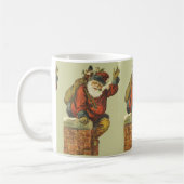ヴィンテージサンタが煙突を下る コーヒーマグカップ (左)