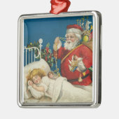 ヴィンテージサンタが眠っている子供を訪れる メタルオーナメント (左)