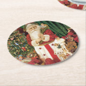ヴィンテージサンタクロースがクリスマスに出産 ラウンドペーパーコースター (アングル)