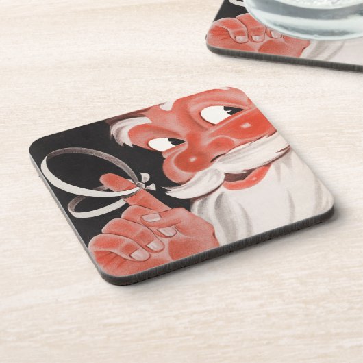 ヴィンテージサンタクロース（指にリマインダーひも付き） コースター (左側)