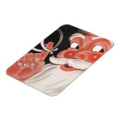 ヴィンテージサンタクロース(指にリマインダーひも付き) マグネット (左側)