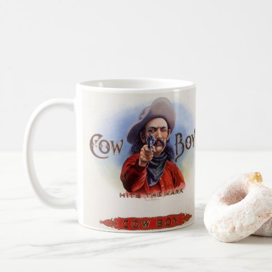 ヴィンテージシガーラベルアート、カウボーイがマークをヒット コーヒーマグカップ (ドーナツ)
