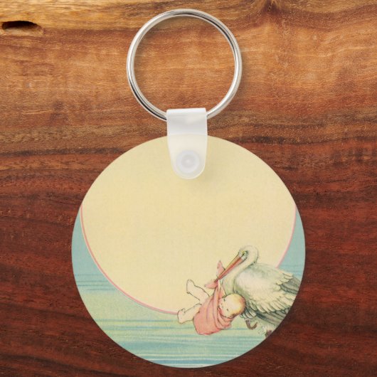 ヴィンテージストークと赤ちゃん少女ピンク毛布 キーホルダー (裏面)