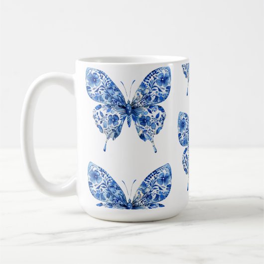 ヴィンテージチノイスリーブルー蝶の花 コーヒーマグカップ (左)