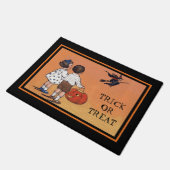 ヴィンテージハロウィーンエフェメラトリックまたはトリート ドアマット (アングル)