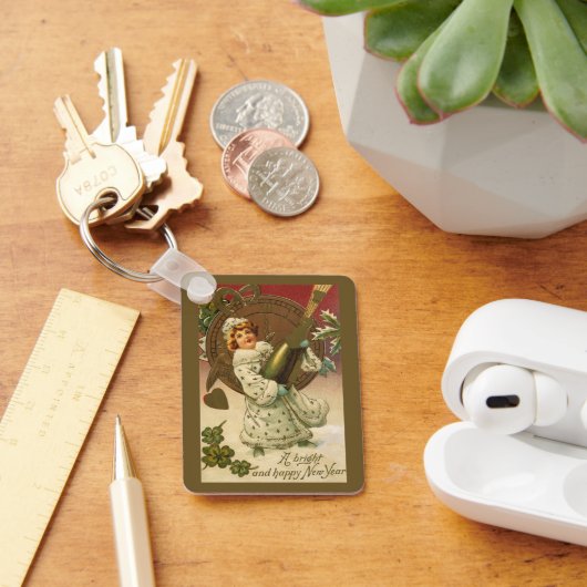 ヴィンテージビクトリアンニューイヤーエブシャンパンエンジェル キーホルダー (デスク)