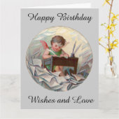 ヴィンテージビッグ誕生日エンジェル書チャイルドアットデスク カード (黄色い花)