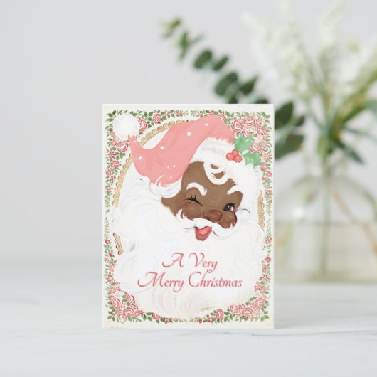 ヴィンテージピンクウィンキングブラックサンタクロースクリスマス シーズンポストカード (スタンド正面)