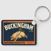 ヴィンテージフルーツクラートラベルアートカウボーイオンピッグロデオ キーホルダー (正面)