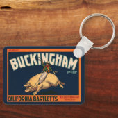 ヴィンテージフルーツクラートラベルアートカウボーイオンピッグロデオ キーホルダー (正面)